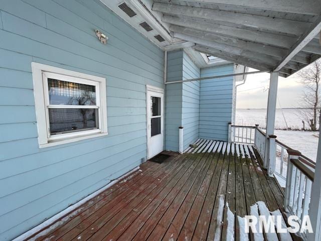 view of snow covered deck