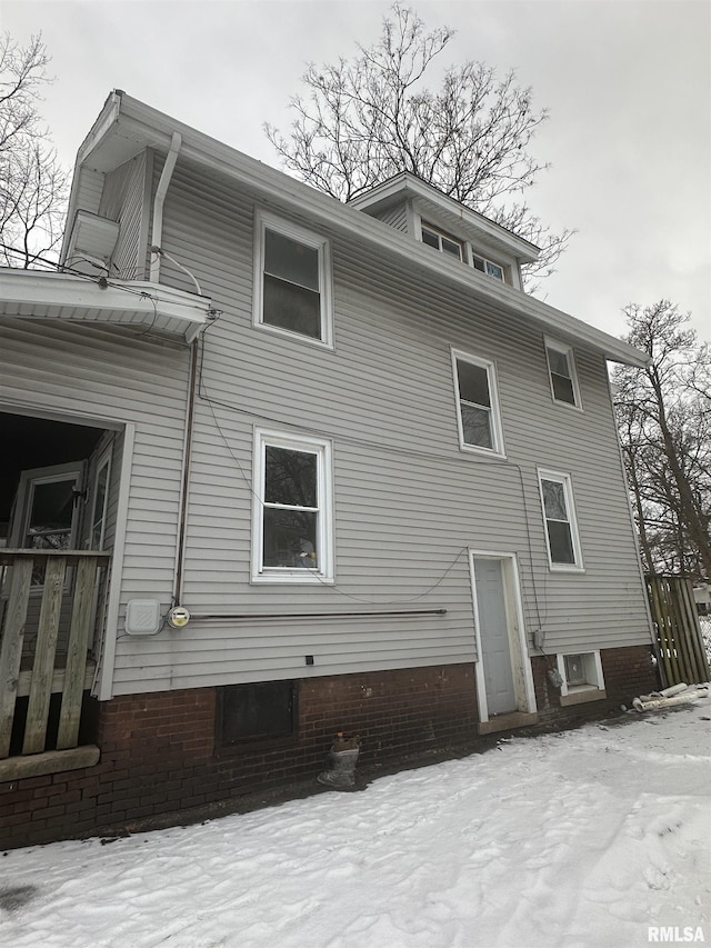 view of snow covered property