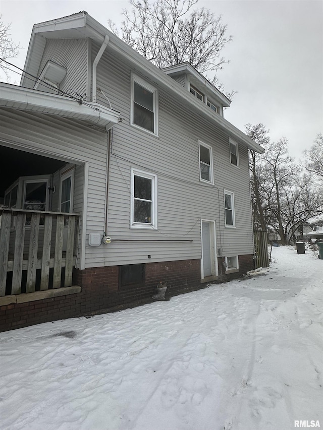 view of snow covered property