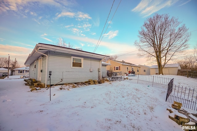 view of snow covered property