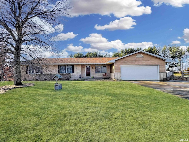 ranch-style home with a front yard and a garage