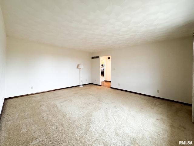 empty room with light carpet