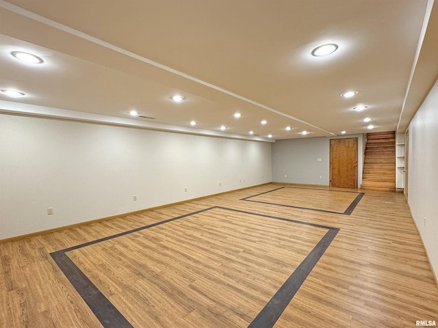 basement featuring built in shelves