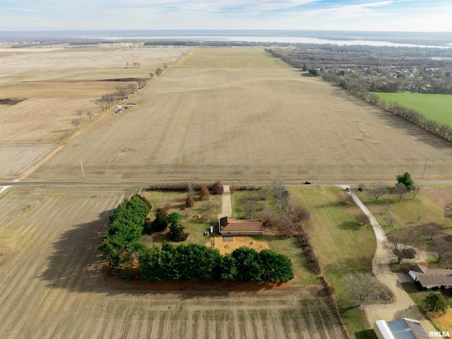 birds eye view of property with a rural view