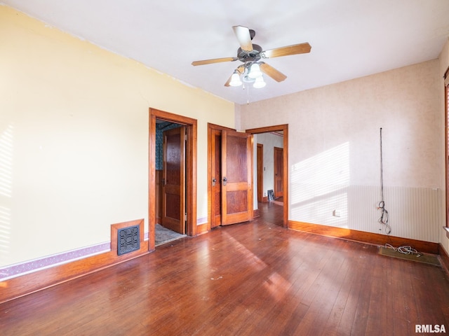 unfurnished bedroom featuring ceiling fan and wood-type flooring