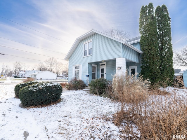 view of snow covered property