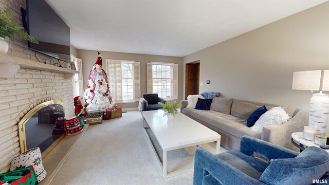 living room with light carpet and a fireplace