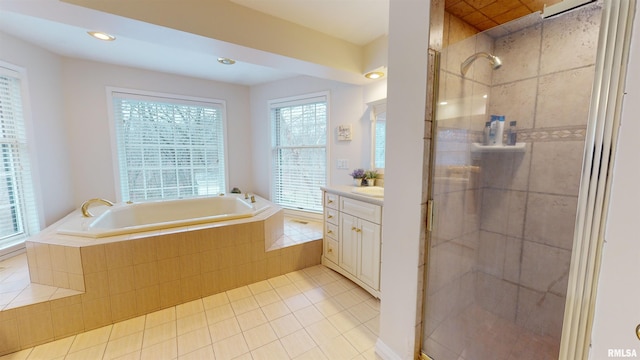 bathroom featuring vanity, separate shower and tub, and tile patterned flooring