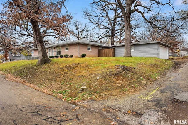 view of property exterior featuring a garage