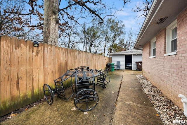 view of patio with a grill