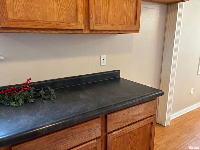 kitchen with light hardwood / wood-style floors