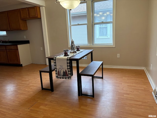 dining space featuring light hardwood / wood-style flooring