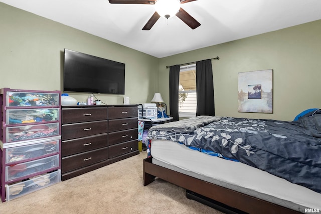 bedroom featuring ceiling fan and carpet floors