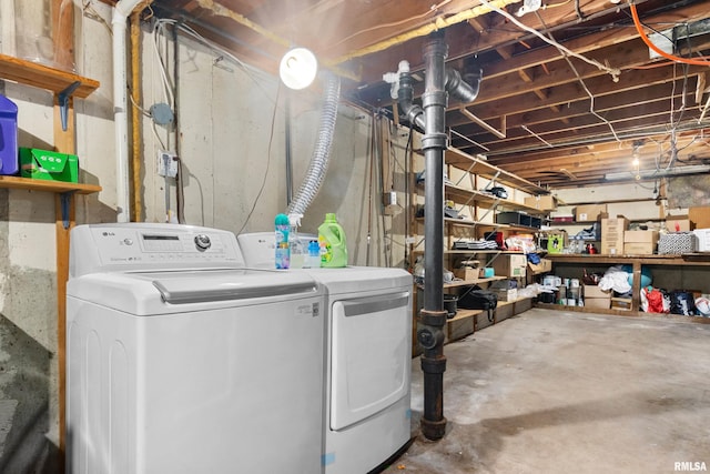 washroom with washer and dryer