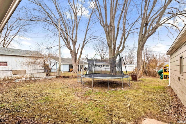 view of yard featuring a trampoline