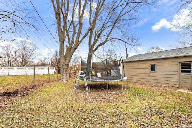 view of yard with a trampoline