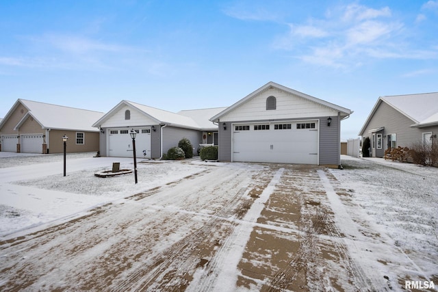 ranch-style house featuring a garage