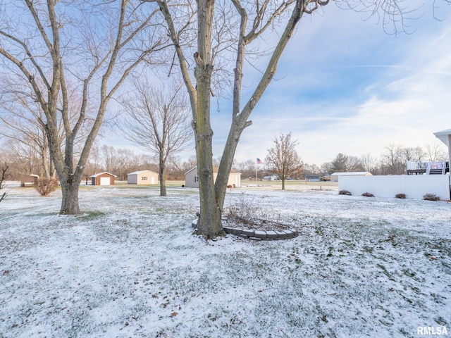 view of yard covered in snow