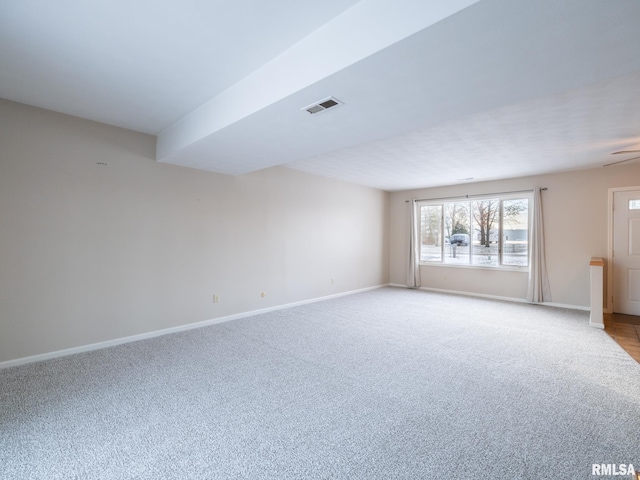 carpeted empty room with ceiling fan