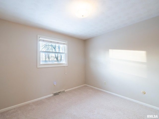 empty room featuring carpet flooring