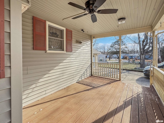 deck featuring ceiling fan and covered porch