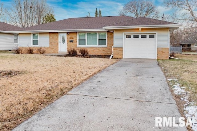 ranch-style home with a garage