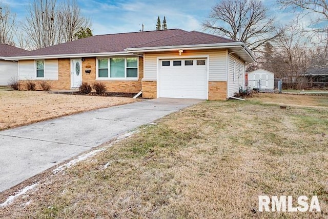 single story home with a front lawn and a garage