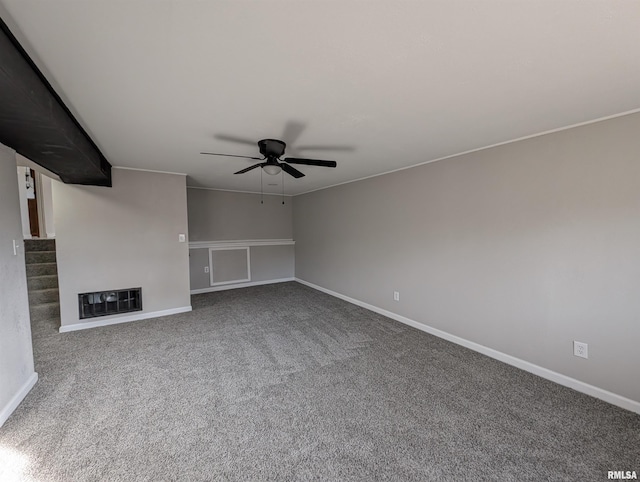 unfurnished living room with ceiling fan and carpet flooring