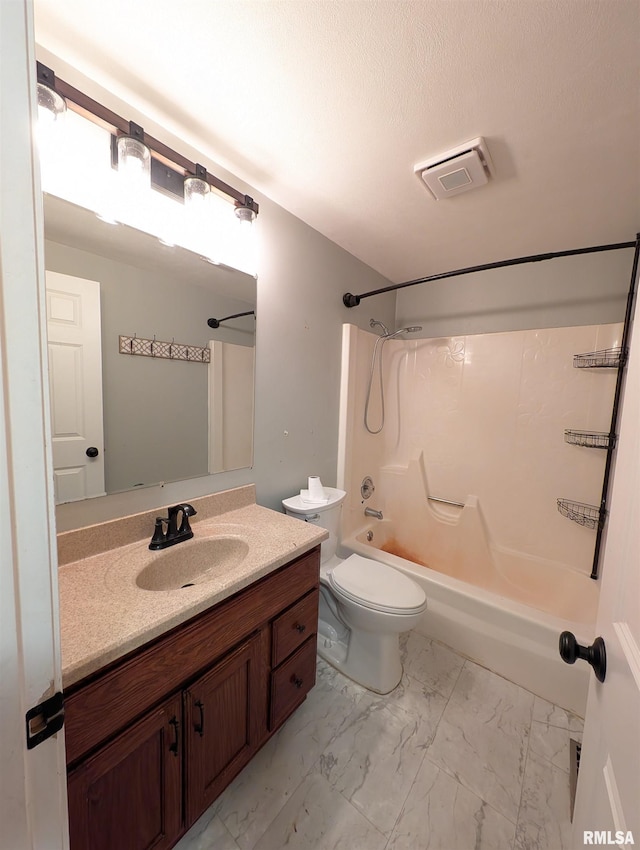 full bathroom with toilet, vanity, and tub / shower combination