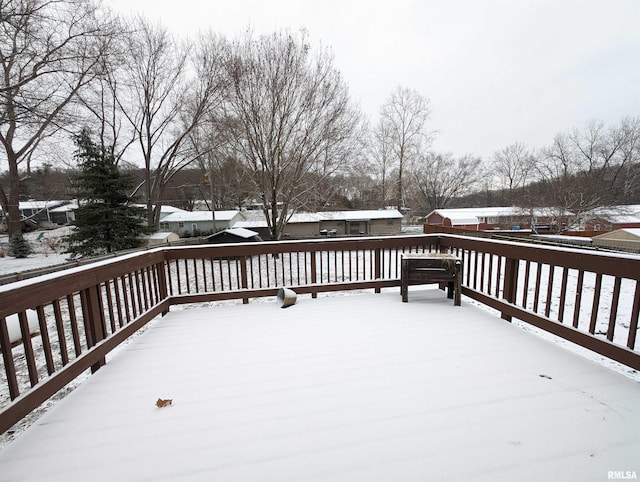 view of snow covered deck