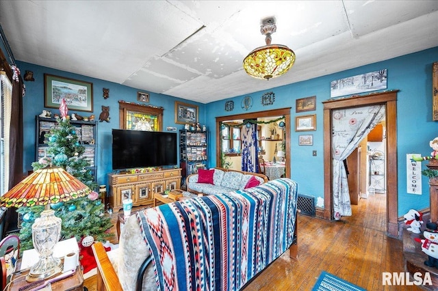 living room with hardwood / wood-style flooring