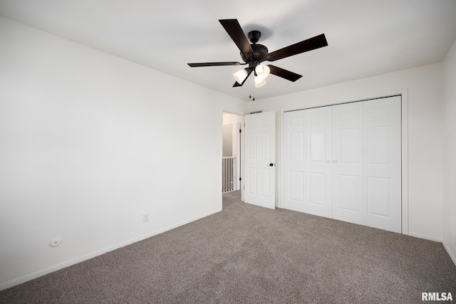 unfurnished bedroom with carpet flooring, a closet, and ceiling fan