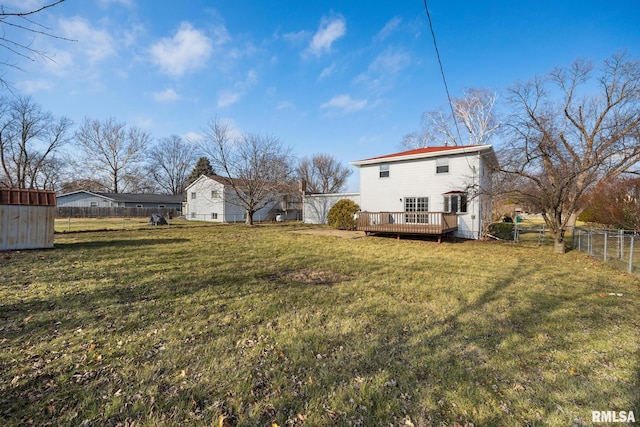 view of yard featuring a wooden deck