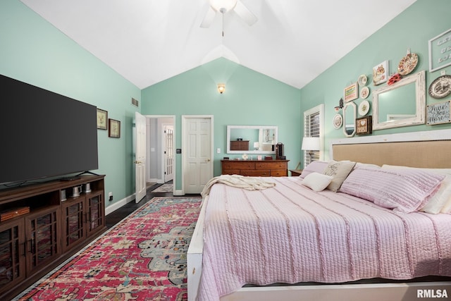 bedroom with ceiling fan and lofted ceiling