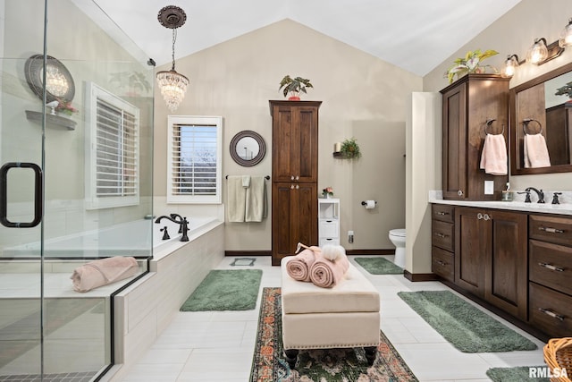 full bathroom with vanity, lofted ceiling, plus walk in shower, an inviting chandelier, and tile patterned flooring