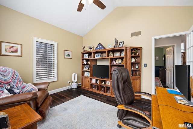 office space featuring dark hardwood / wood-style floors, high vaulted ceiling, and ceiling fan