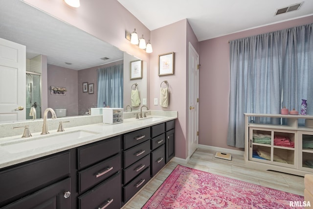 bathroom featuring hardwood / wood-style floors and vanity