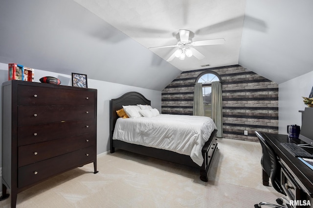 bedroom featuring light carpet, ceiling fan, and lofted ceiling