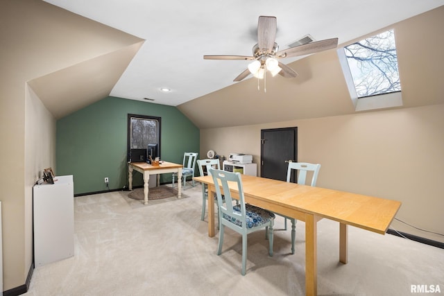 home office with ceiling fan, lofted ceiling, and light carpet