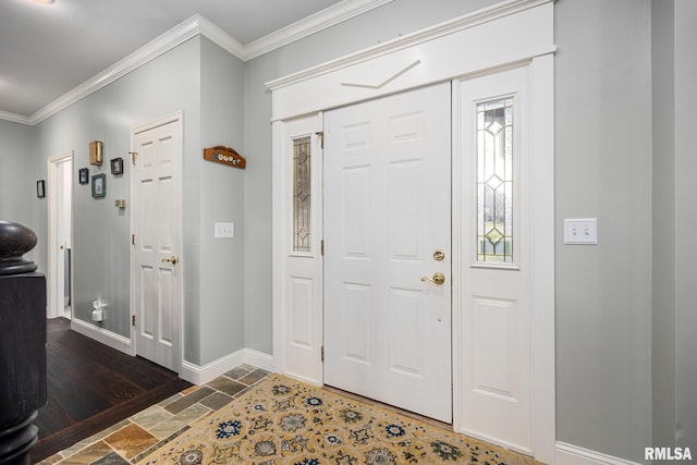 entrance foyer with crown molding and dark wood-type flooring