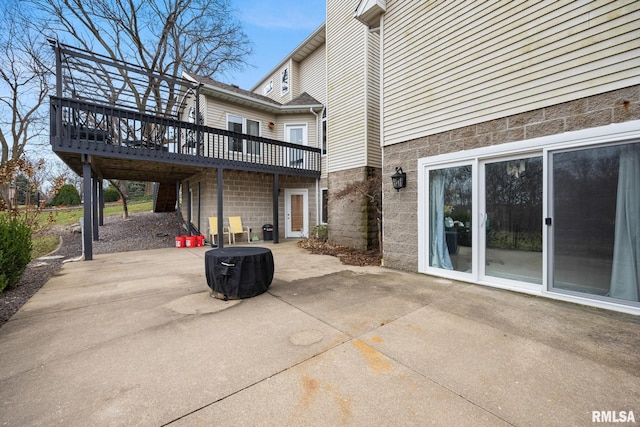 view of patio featuring a wooden deck