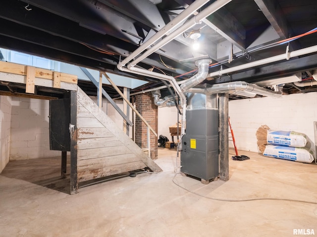 basement featuring heating unit