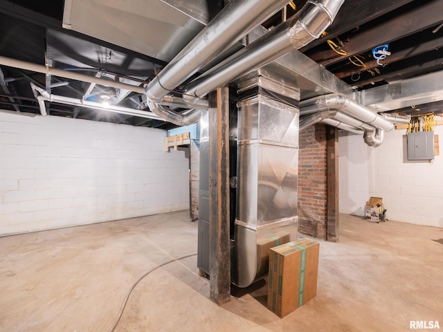 basement with electric panel and heating unit