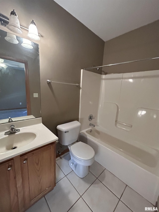 full bathroom with tile patterned floors, vanity, toilet, and bathtub / shower combination