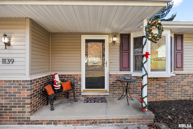 property entrance with a porch