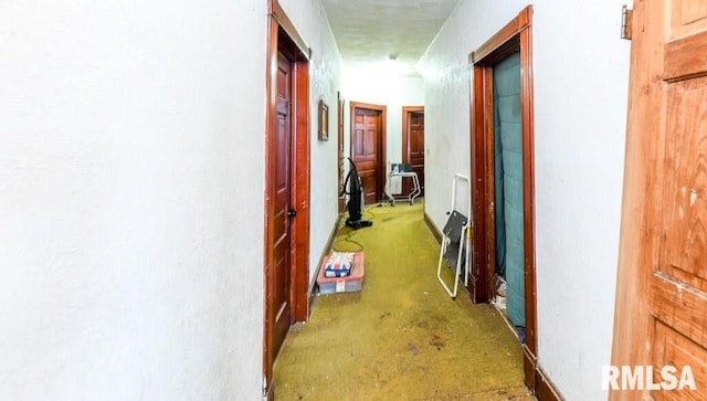 corridor featuring concrete floors