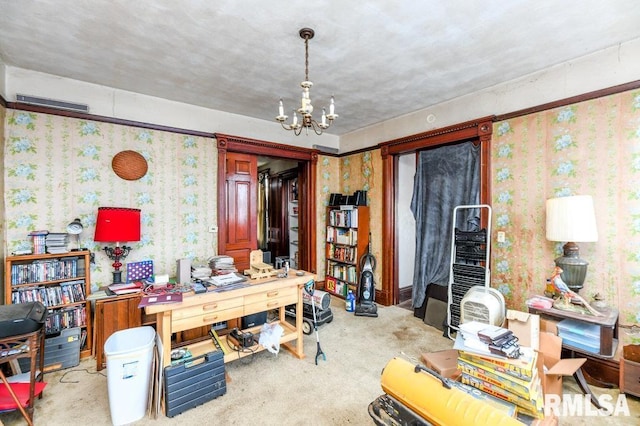 carpeted home office featuring an inviting chandelier