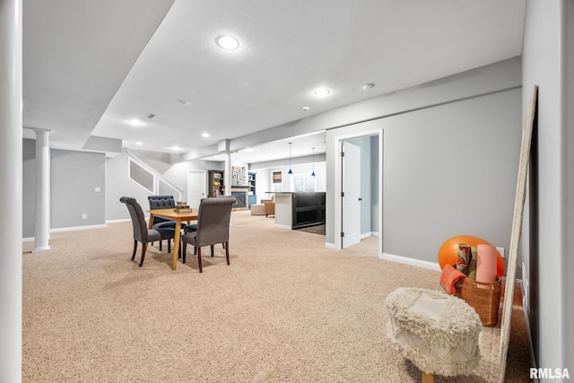 dining room featuring light colored carpet