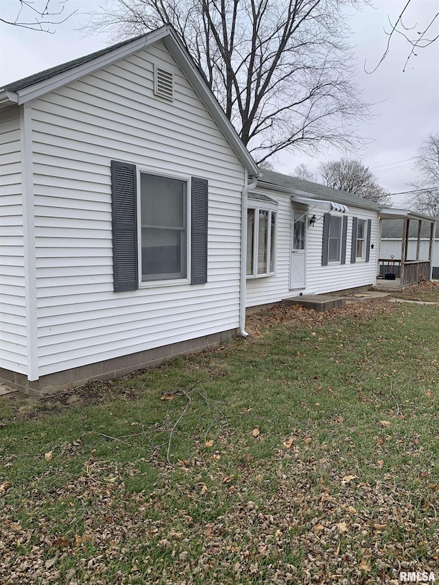 exterior space featuring a front lawn