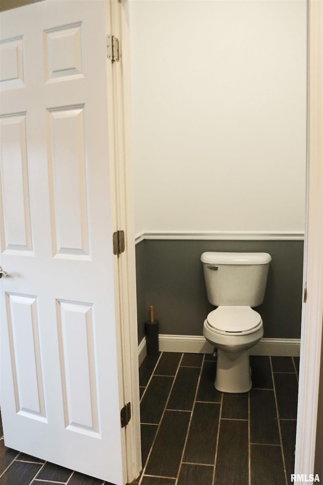 bathroom featuring tile patterned flooring and toilet